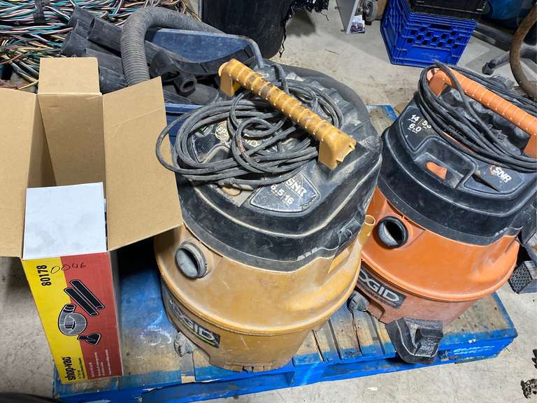 Pair of Rigid Shop Vacs with Hoses and Attachments Jardine Auctioneers