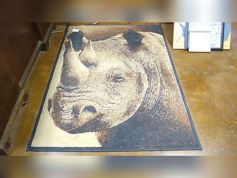 4' X 5.5' RHINO RUG Jeff Martin Auctioneers