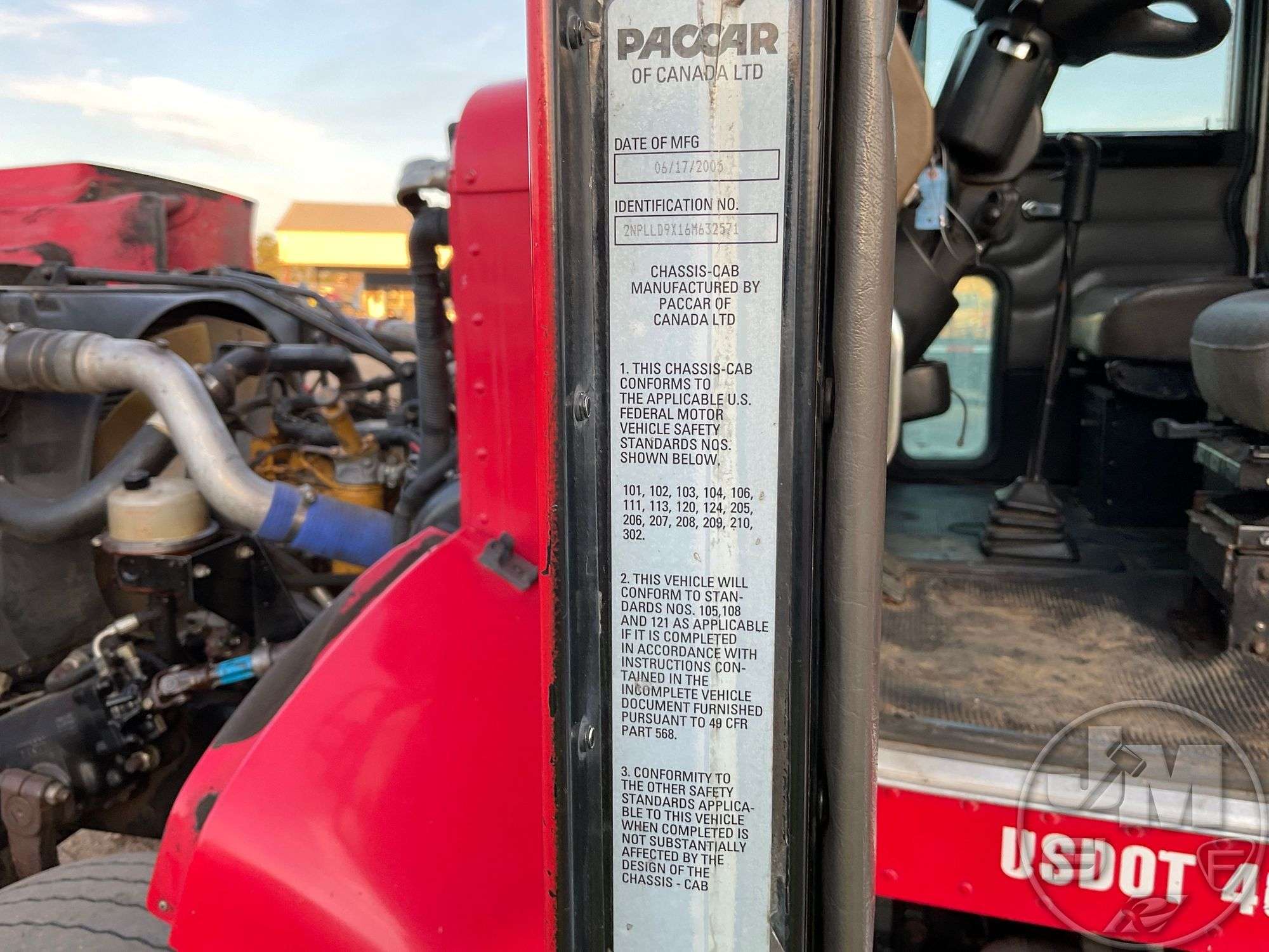 2006 PETERBILT 335 TRI-AXLE DUMP TRUCK VIN