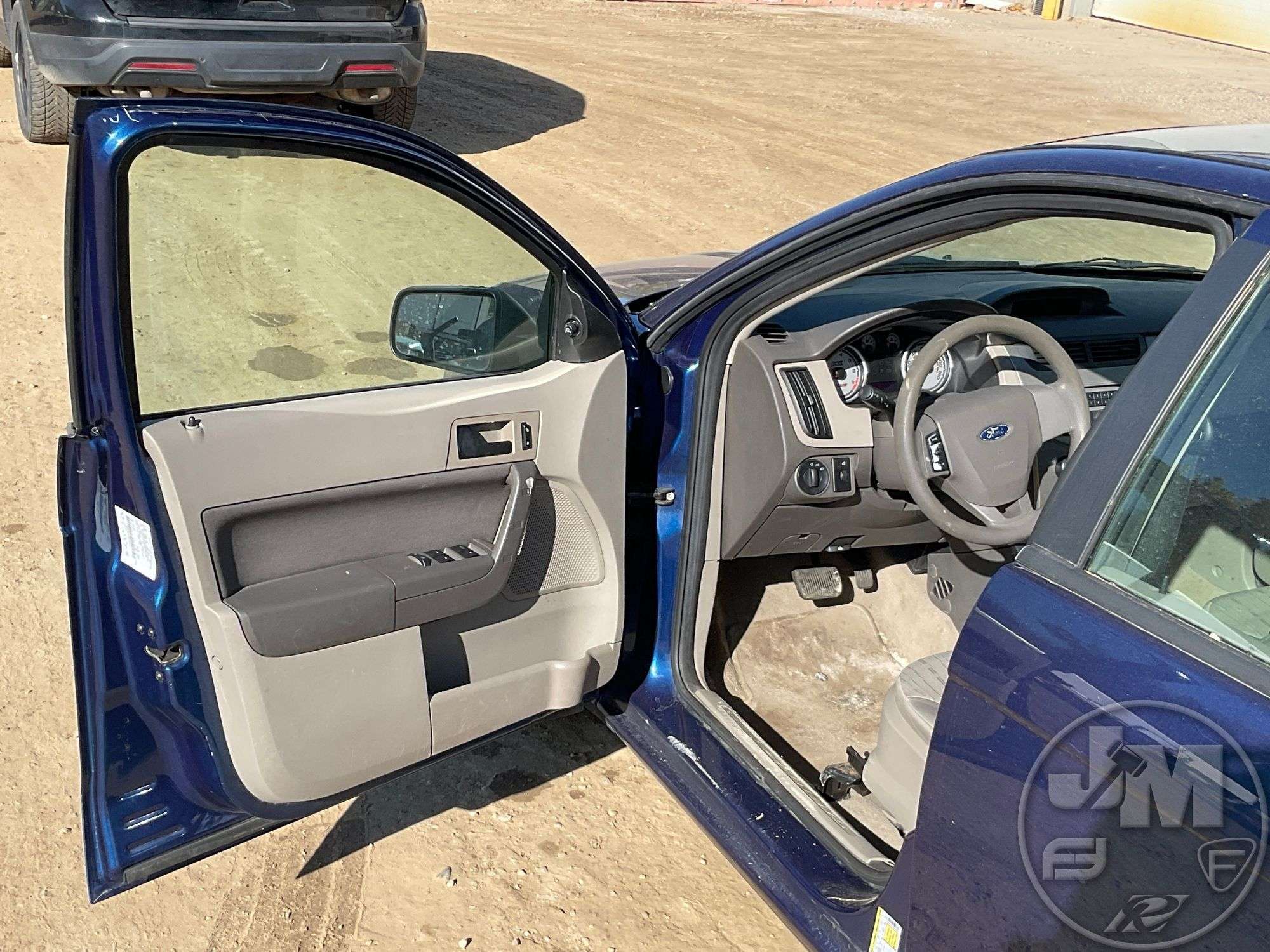 2008 FORD FOCUS VIN: 1FAHP35N78W285573 FWD - Jeff Martin