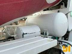 2014 OSHKOSH S. SERIES TRI-AXLE FRONT DISCHARGE MIXER TRUCK VIN: 10TAFLGF5ES770894