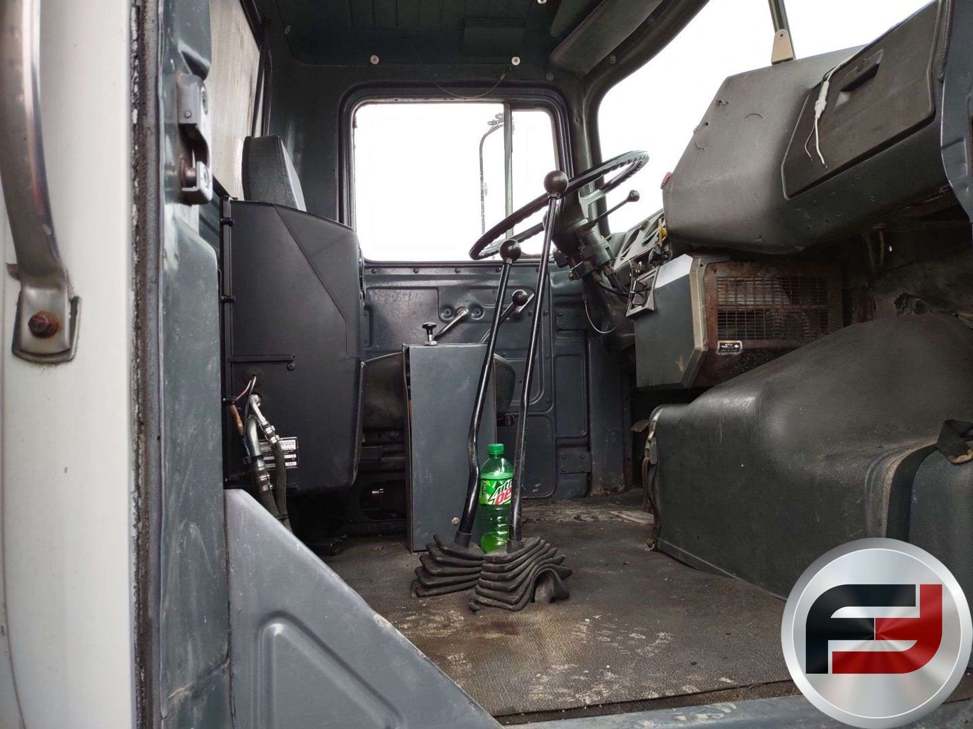 大量まとめ売り！ 1977 MACK DM685 Dump Truck - J.M. Wood Auction Company, Inc.