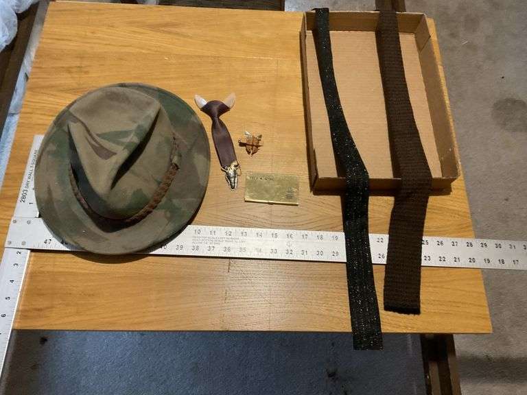 Hat and ties etc. Legacy Auction Company