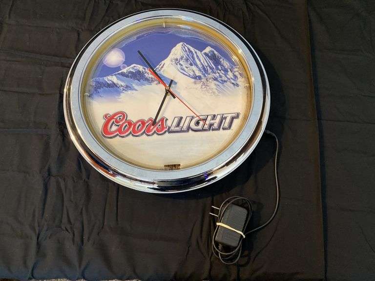 Coors light, neon lighted clock Legacy Auction Company