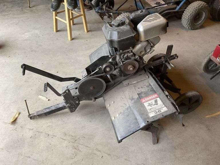 36 in. Pull behind Rototiller with 6 h Briggs Legacy Auction Company