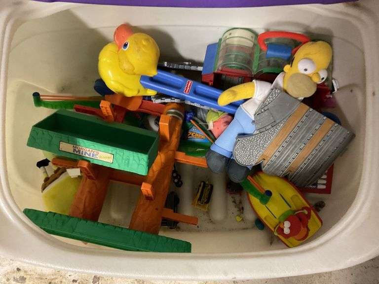 Plastic toy box with toys Legacy Auction Company