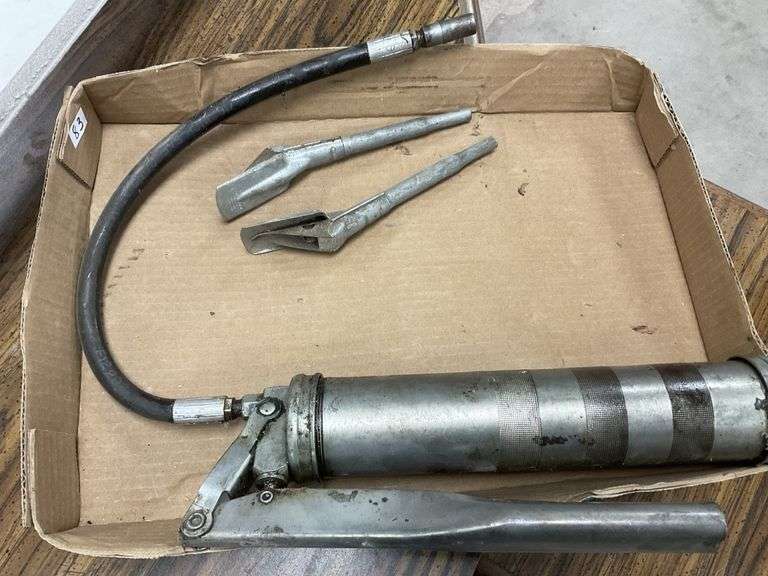 Grease gun & attachments Legacy Auction Company