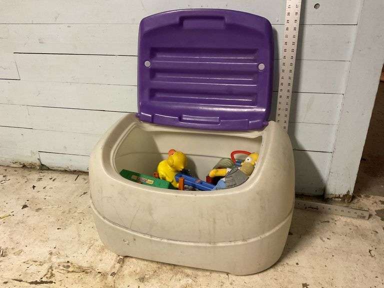 Plastic toy box with toys Legacy Auction Company