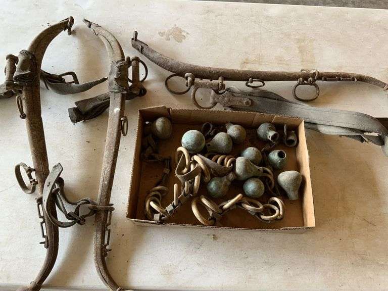 Brass knobs, horse hames Legacy Auction Company