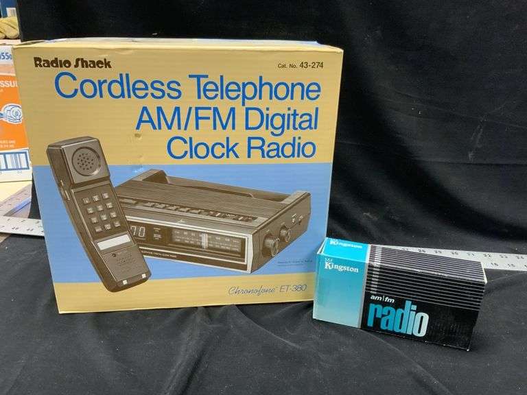 RadioShack Cordless telephone clock radio, new in Legacy Auction Company