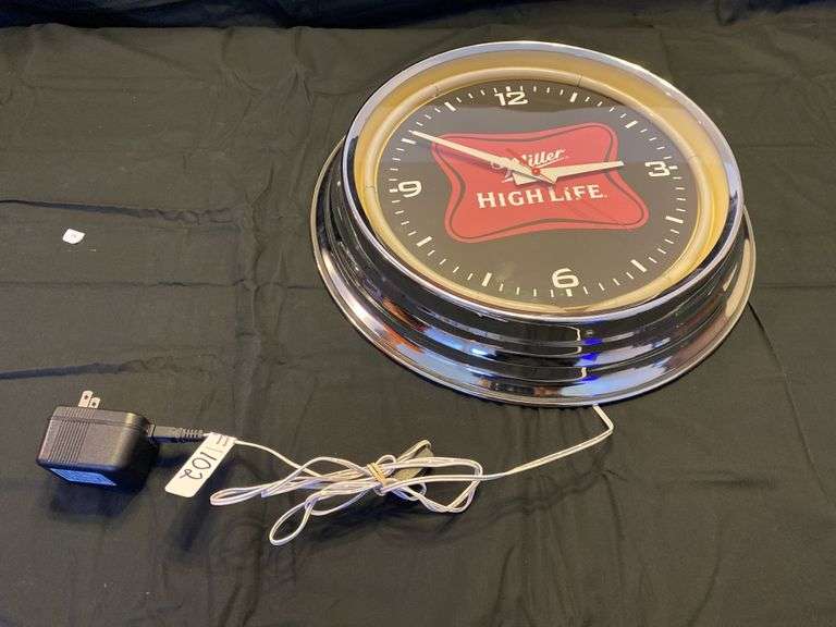 Miller high life lighted neon clock Legacy Auction Company