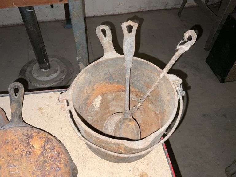 Cast iron pan & utensils Legacy Auction Company