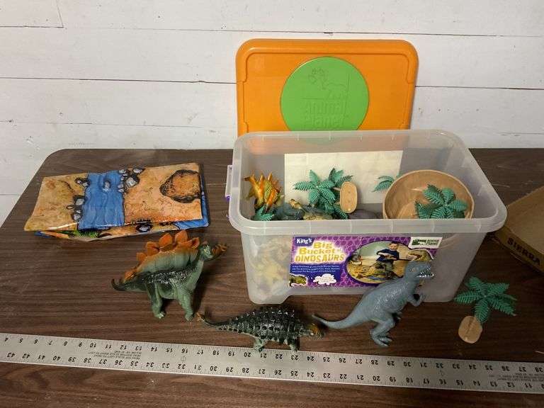 Big bucket of dinosaurs Legacy Auction Company