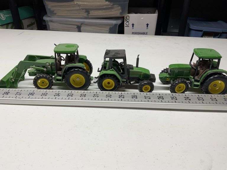 John Deere toy tractors Legacy Auction Company