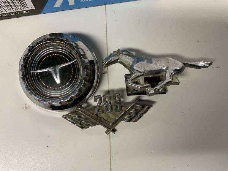 Gas cap, emblems Legacy Auction Company