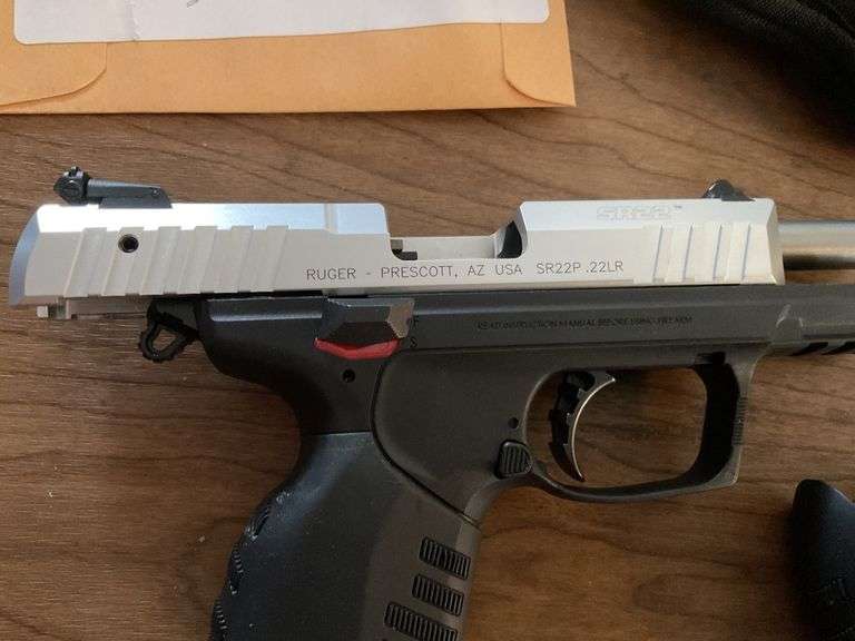 Ruger 22 gun, clip, holder Legacy Auction Company