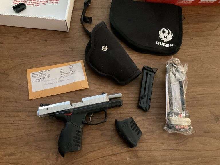 Ruger 22 gun, clip, holder Legacy Auction Company