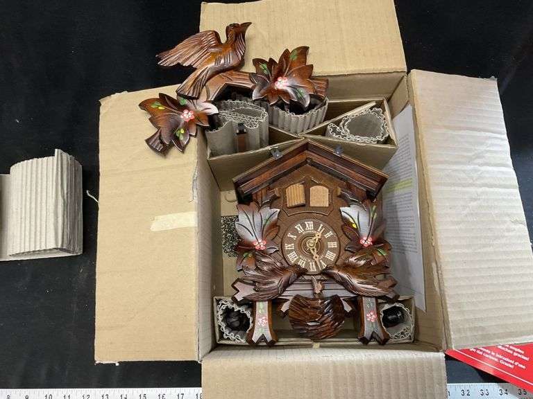 Cuckoo clock. Keeps time but needs work Legacy Auction Company