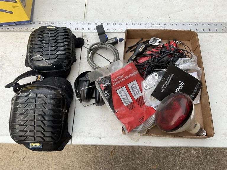Kneepads, bike lock etc. Legacy Auction Company