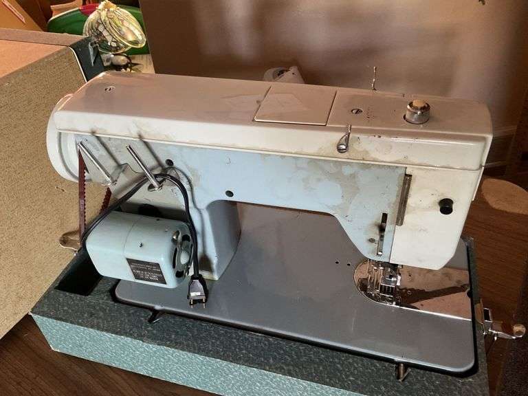 Dressmaker sewing machine Legacy Auction Company