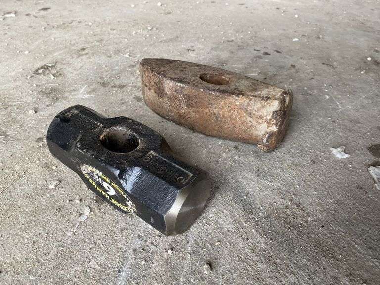 Sledgehammer heads (one new) Legacy Auction Company