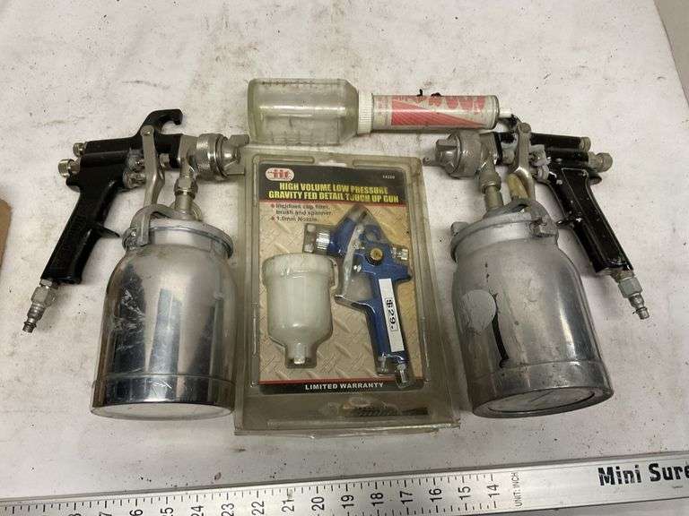 Paint guns Legacy Auction Company