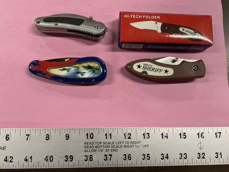 Assorted Folding knives Legacy Auction Company