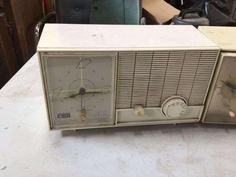Three vintage clock radios, work Legacy Auction Company