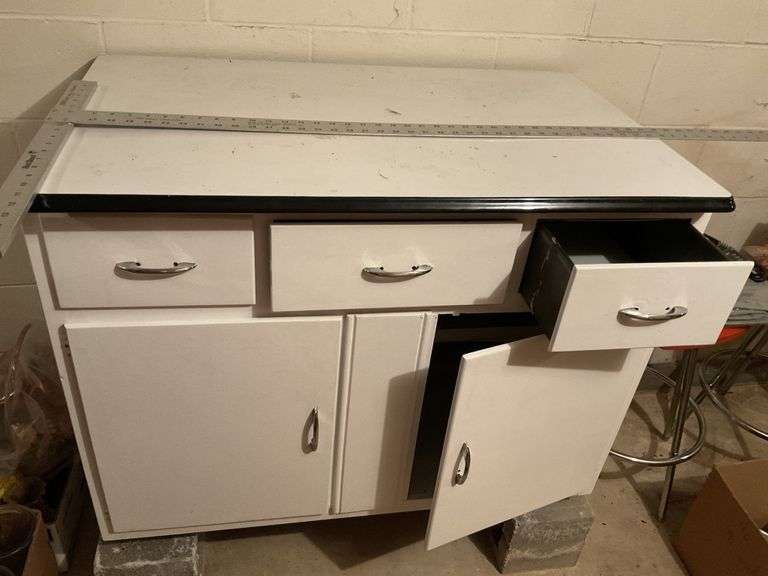 Enamel top cupboard Legacy Auction Company