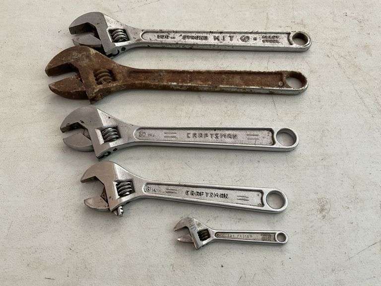 Assorted adjustable wrenches Legacy Auction Company