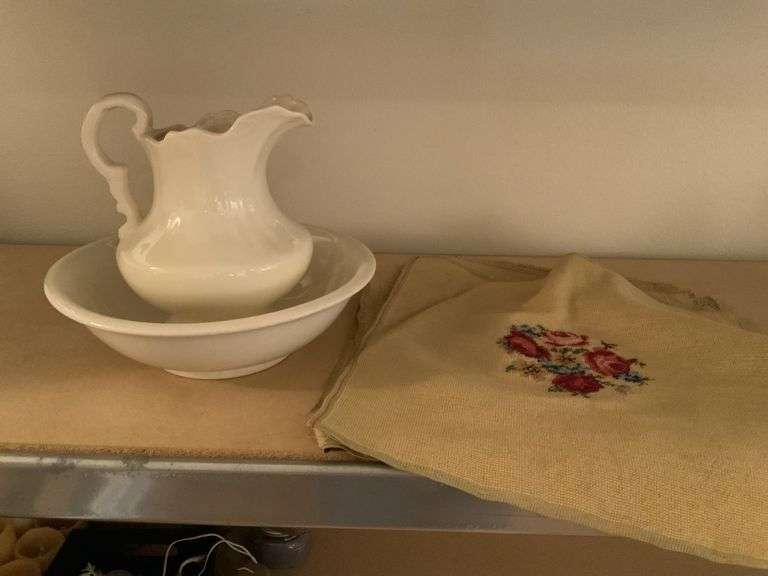 Wash basin and pitcher plus needlepoint covers Legacy Auction Company
