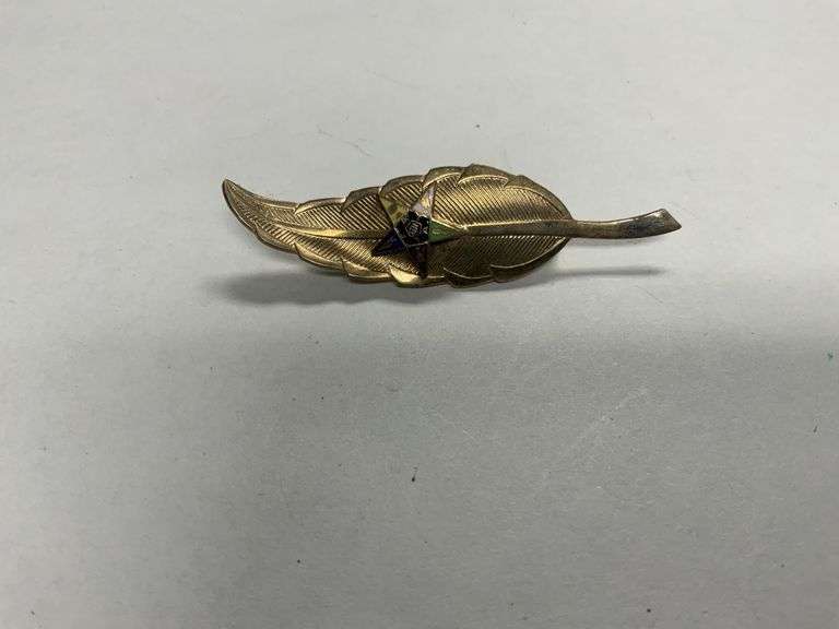 Vintage Christmas pins, aqua pins, cameo pin etc. Legacy Auction Company