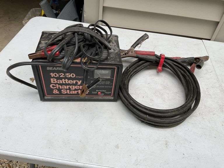 Battery charger and jumper cables Legacy Auction Company