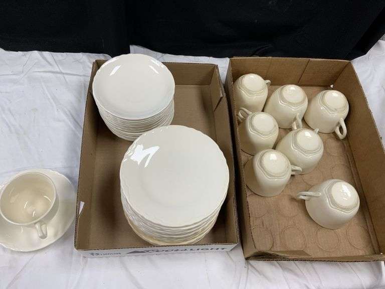 USA pottery cups, saucers and dessert plates Legacy Auction Company