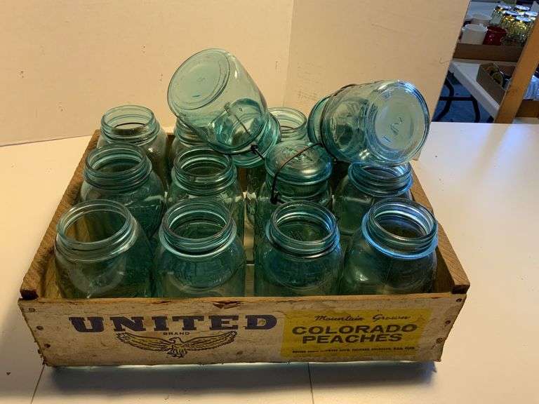 Blue canning jars Legacy Auction Company