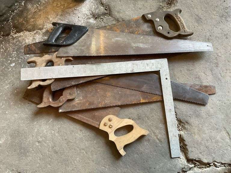 Assorted hand saws and square Legacy Auction Company