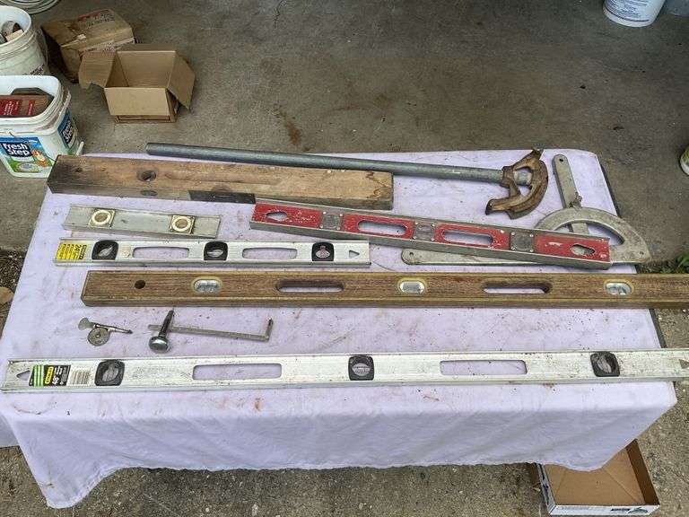 Assorted levels and halfinch EMT bender etc. Legacy Auction Company