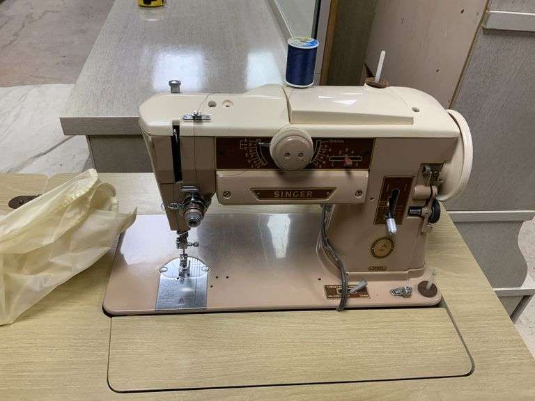 Vintage singer sewing machine and seat legacy auction company