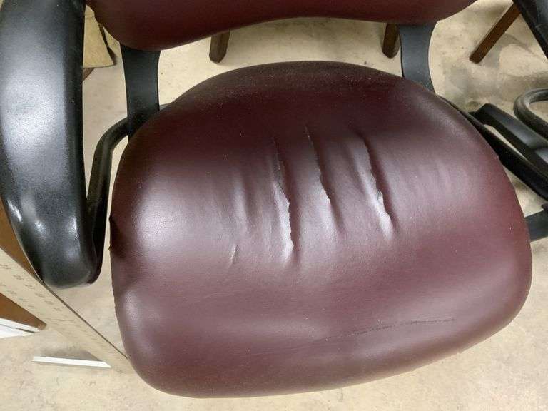 Two office chairs, some damage Legacy Auction Company