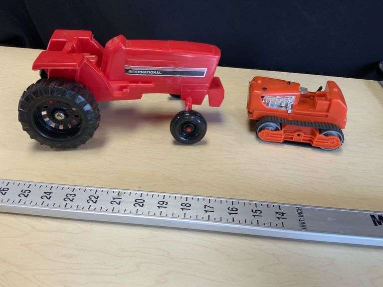 Plastic international tractor and IH? Crawler, Legacy Auction Company
