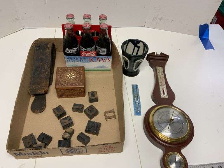 Razor strap, barometer, letters, Coke bottles, Legacy Auction Company