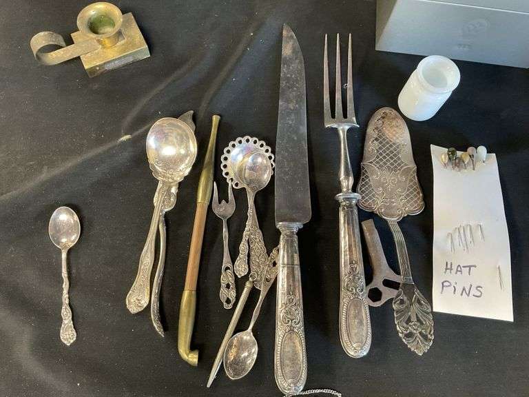 Metal serving trays, canister, utensils etc. Legacy Auction Company