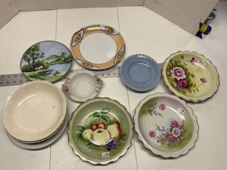 Decorative plates and bowls Legacy Auction Company