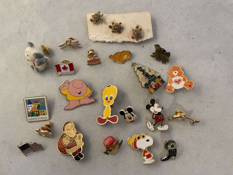 Character/novelty pins Legacy Auction Company