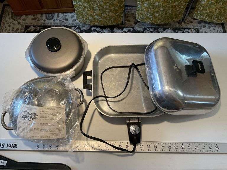 Electric fry pan and other assorted pans Legacy Auction Company
