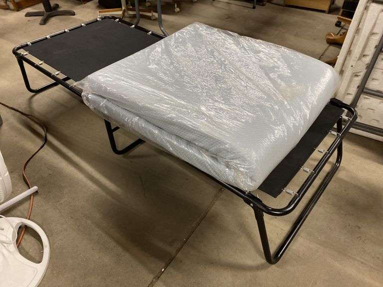 Folding cot with mattress Legacy Auction Company