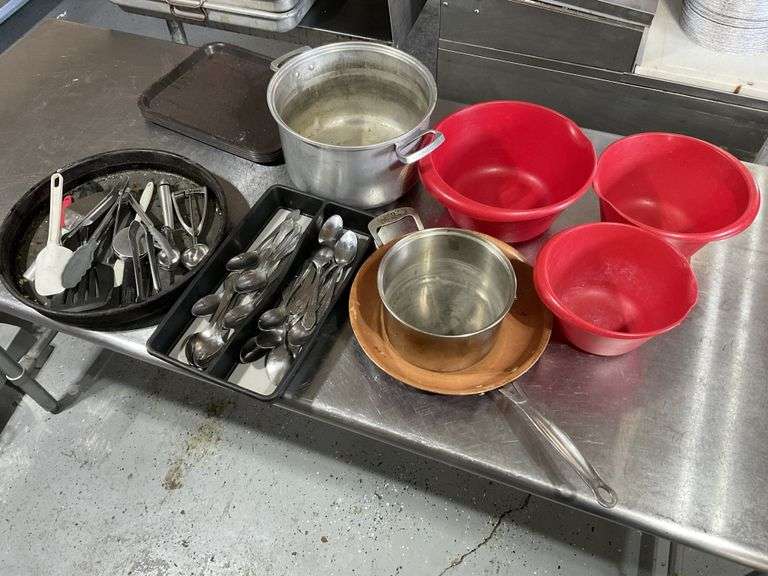 Utensils serving trays etc. Legacy Auction Company