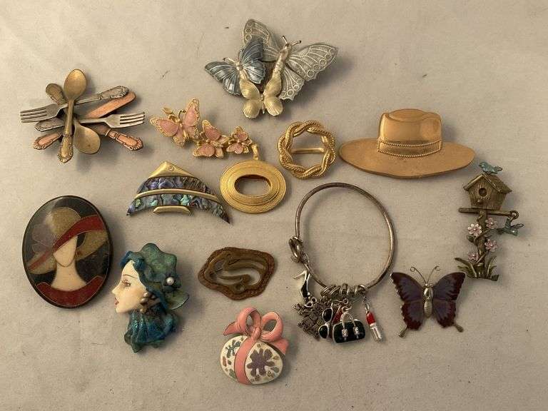Costume jewelry pins Legacy Auction Company