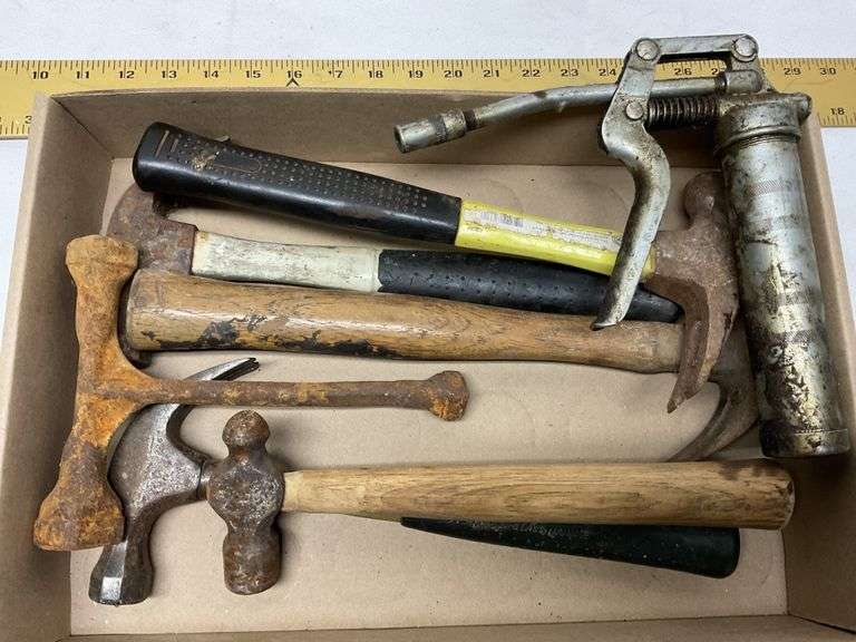 Hammers and grease gun Legacy Auction Company