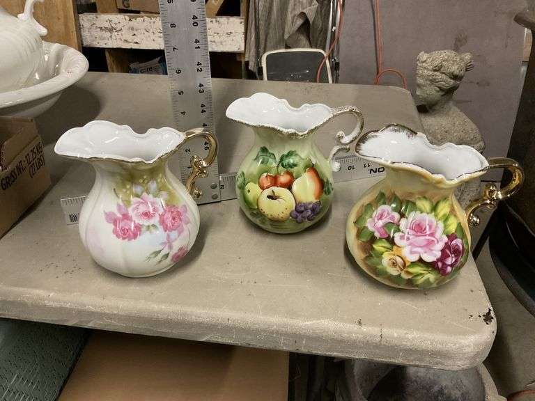 Decorative pitchers Legacy Auction Company